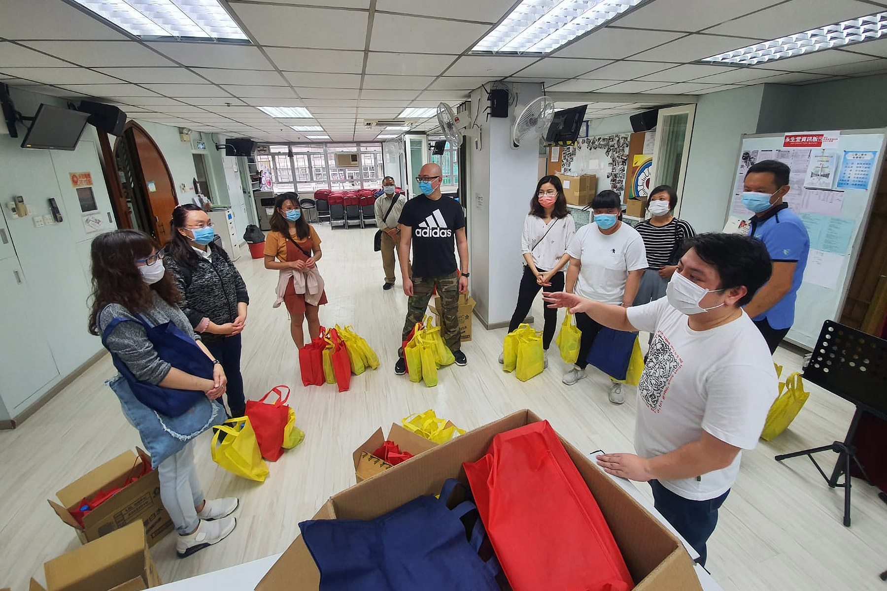 Volunteers at the Eternal Life Lutheran Church in Hong Kong prepare supplies to distribute to local people in need