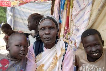 Tabisa Nyabol and her grandchildren in Adjumani, Uganda. Photo: ACT-DCA-LWF/Mai Gad