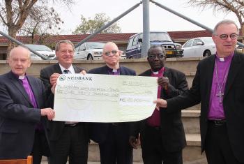 LWF Delegation presenting donation to drought relief. © The Namibian
