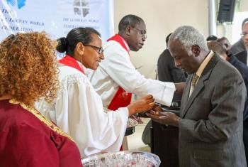 The ALCLC started with an opening eucharistic service at the Mekane Yesus Seminary chapel in Addis Ababa, Ethiopia. Seen here, Bishop Dr Jean Baiguele (Cameroon) and Rev. Tseganech Ayele (Ethiopia) distributing Holy Communion. Photo: LWF/ALCINET Erick Adolph