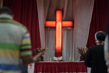 Congregants gather in prayer at the Finfinne Oromo Mekane Yesus Congregation of the Ethiopian Evangelical Church Mekane Yesus on the first Sunday following the unrest in Ethiopia, which also affected Mekane Yesus members directly. Photo: LWF/Albin Hillert
