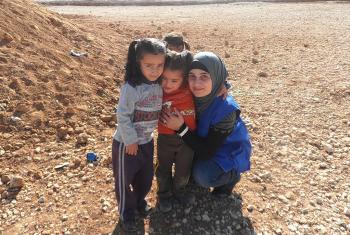 Wejdan Jarrah with children at Za’atri refugee camp. Photo: LWF Jordan
