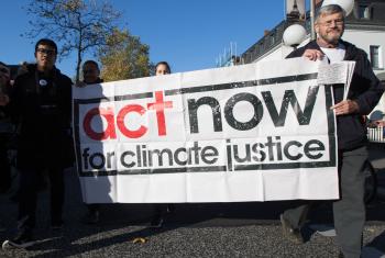 Thousands of climate activists from across the world took to the streets of Bonn just before the start of the UN climate conference COP23. The march was called "Fight for Climate Justice. End Coal!" The ACT Alliance took part in the march with a banner "act now for climate justice". Photo: WCC/Sean Hawkey