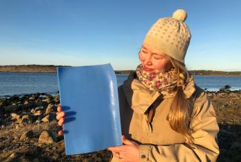 Solveig Egeland, an artist and cultural advisor to the Church of Norway’s Diocese of Borg with a piece of plastic from the ocean. Photo: Mari Tefre