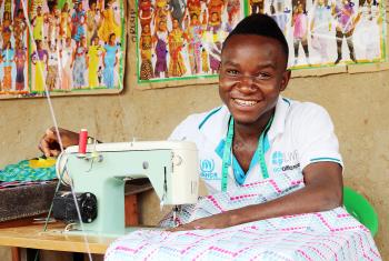 In Uganda, LWF’s humanitarian work includes support to people who have fled conflict in neighboring South Sudan and DRC. At the Rwamwanja refugee settlement, Congolese Zubert Masuku is now a highly skilled fashion designer, who also trains fellow youth for free. Photo: LWF/ S. Nalubega