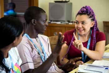 Group discussion during the training among Hanna Wright-Osborn (left) of the Evangelical Lutheran Church in America,  Levi Joniel (centre) of The Lutheran Church of Christ in Nigeria and  Angelica Oquendo (right) of the Evangelical Lutheran Church of Colombia. Photo: LWF/Ben Gray