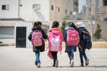 A group of girls head to a school in Jordan’s Sahab district that is supported by LWF for both Jordanian and Syrian children. Photo: LWF/Albin Hillert