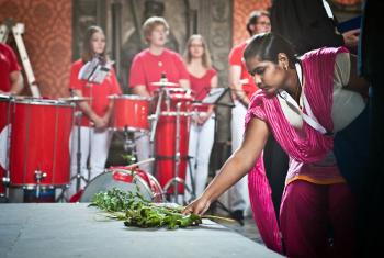 During opening worship in the Castle Church, young reformers were invited to bring to the altar symbolic gifts from their respective regions. Photo: LWF/Marko Schoeneberg
