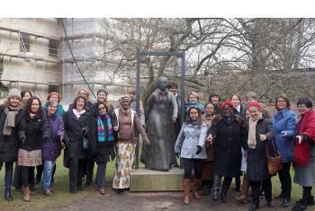 The LWF working group on "Women on the Move" at the statue of Katharina von Bora, during a tour of Luther House and other Reformation landmarks in Wittenberg, Germany. Photo: LWF