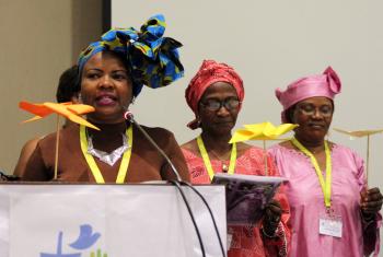 Presenting the Women’s Message at the Africa Pre-Assembly symbolized by the four wings of a windmill are (from left) Faustina Manyangu (Evangelical Lutheran Church in Tanzania), Council member Titi Malik (The Lutheran Church of Christ in Nigeria), and Rev. Dr Jeannette Ada Maina (Evangelical Lutheran Church of Cameroon). Photo: LWF/A. Weyermüller