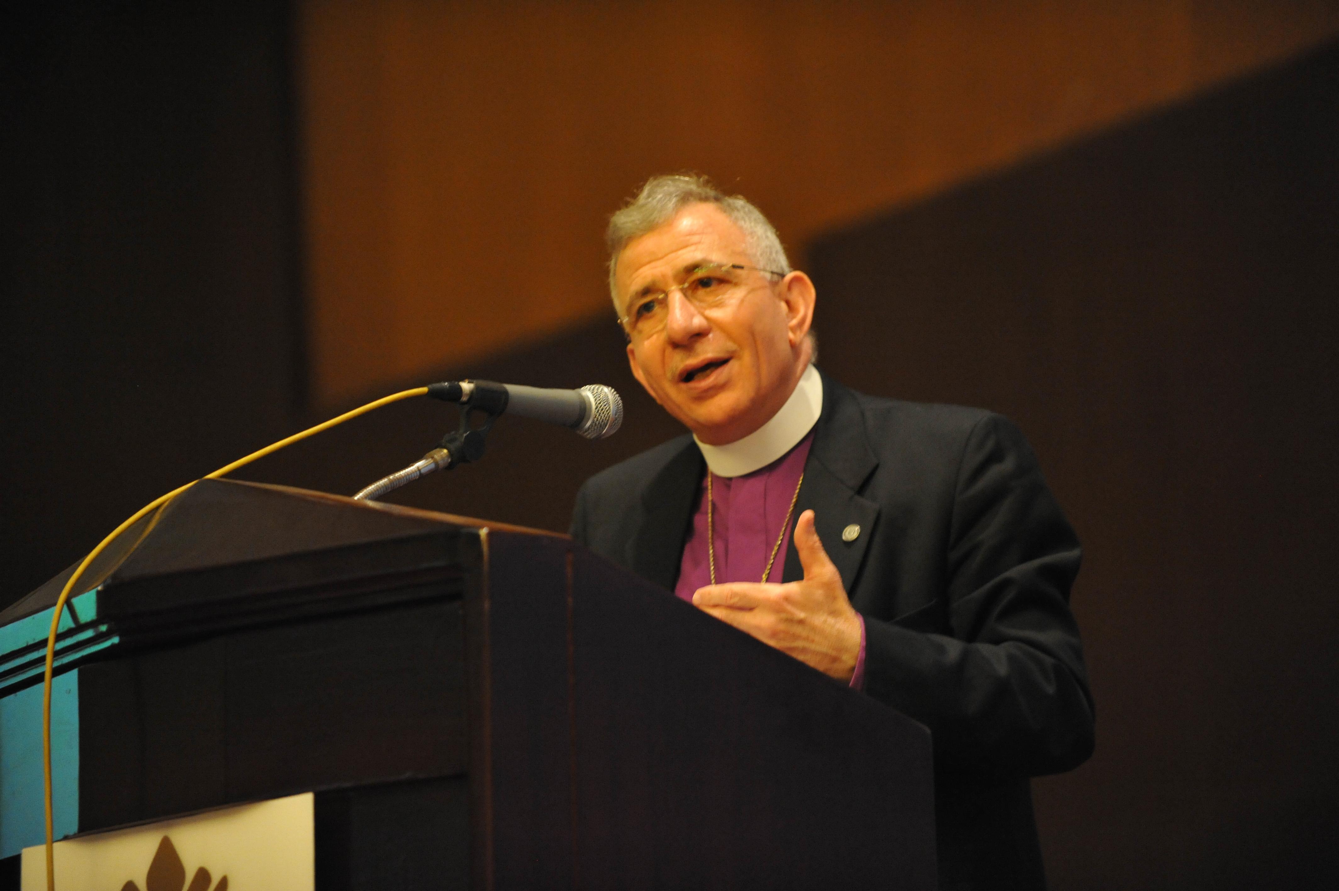 LWF President Bishop Dr Munib Younan delivers his address at the 2014 Council meeting. Photo: M. Renaux