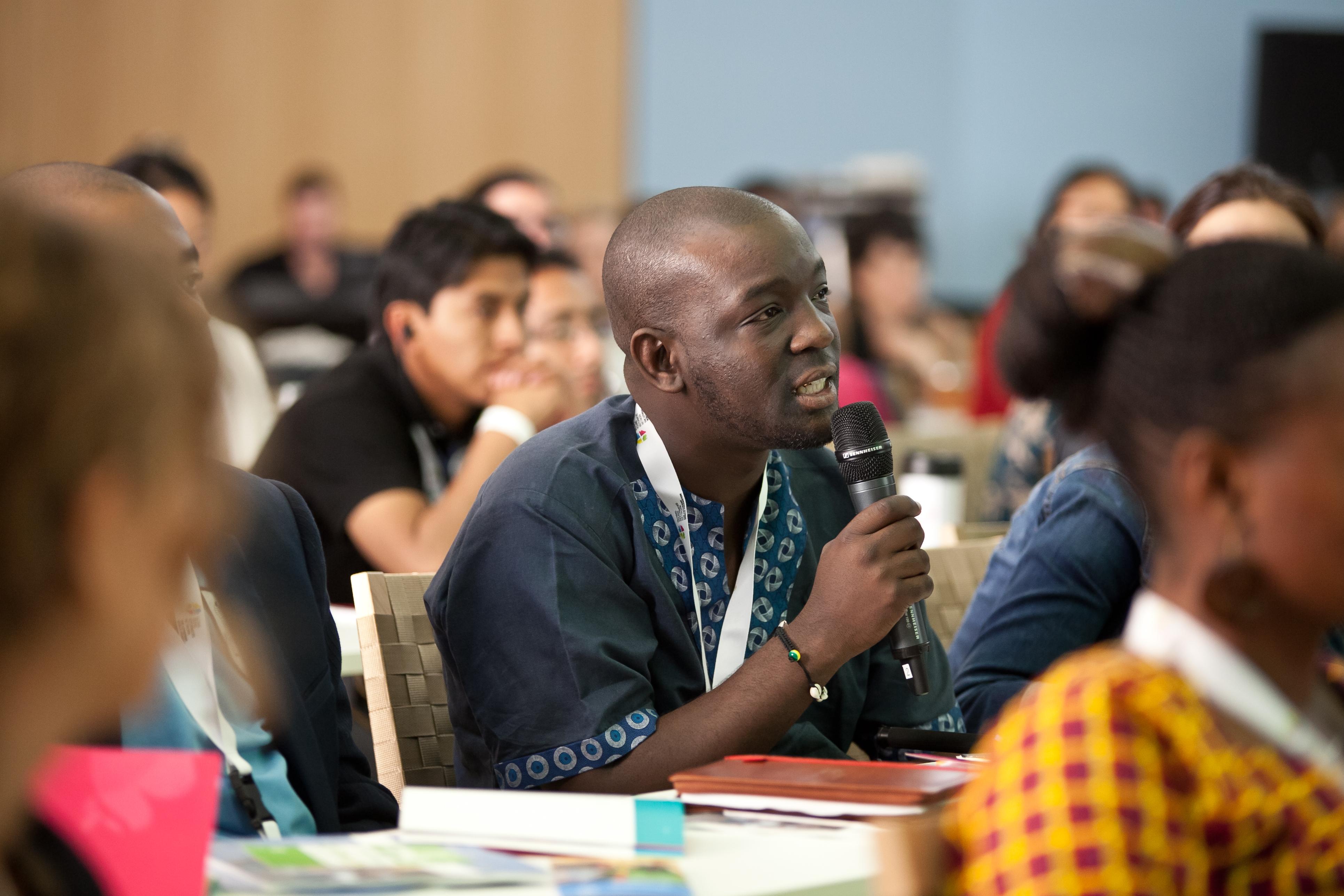 A delegate at a LWF youth meeting makes a submission. Photo: LWF/Marko Schoeneberg