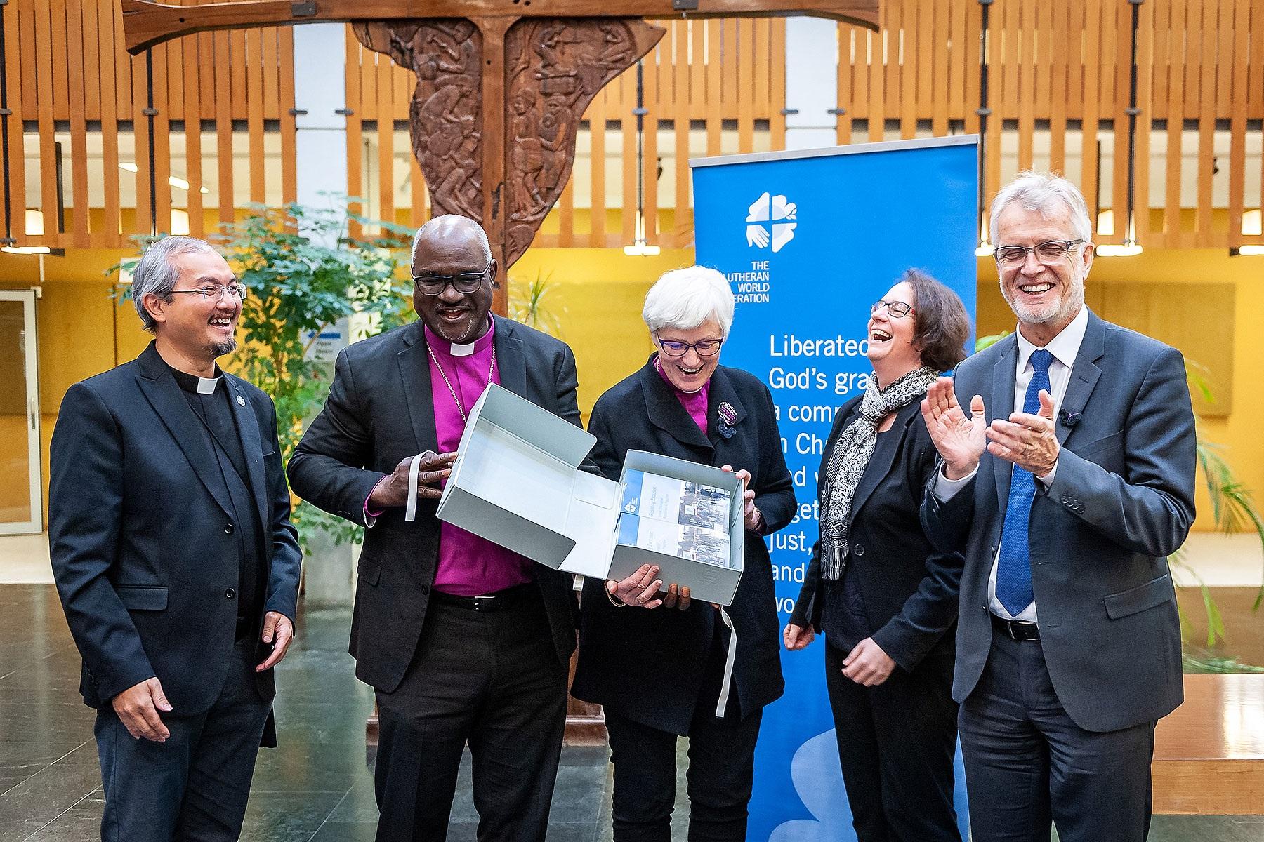 LWF President Archbishop Dr Panti Filibus Musa (second left) and Vice-President, Archbishop Dr Antje JackelÃ©n (middle) unveil the publication, Resisting Exclusion- Global Theological Responses to Populism, together with General Secretary Rev. Dr Martin Junge (far right), co-editor Rev. Dr Simone Sinn (second right) and Rev. Dr Sivin Kit (far left), LWF program executive for Public Theology and Interreligious Relations. Photo: LWF/S. Gallay  