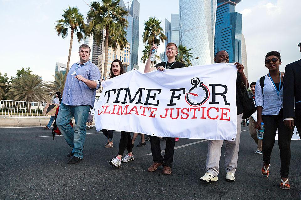 Lutheran youth and ecumenical partners joined hundreds of demonstrators on 1 December for a climate march in Qatar to demand action at the COP 18 summit. Â© LWF/Sidney Traynham