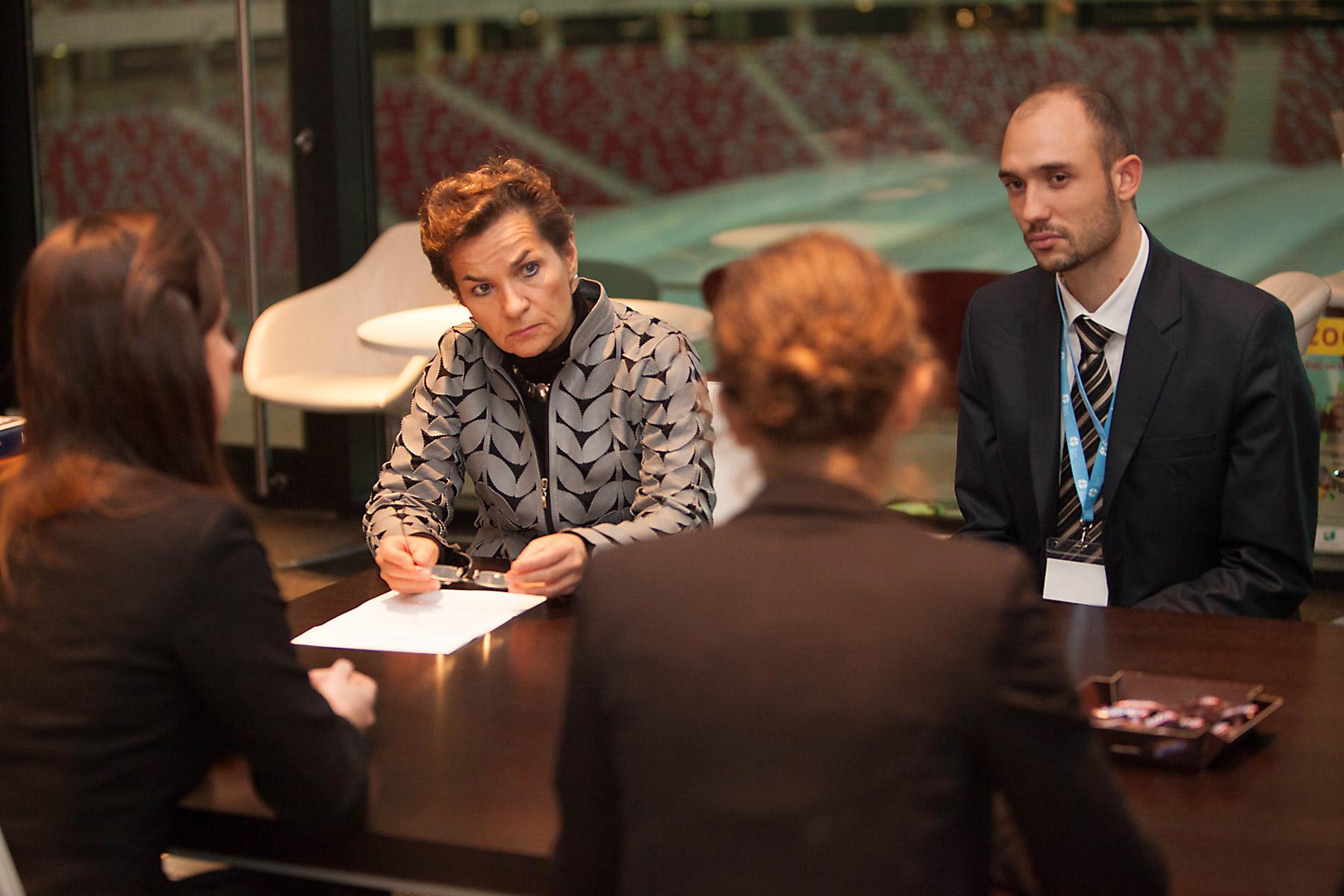 Cristiana Figueres speaking with the LWF COP19 delegation. Photo: LWF/Sean Hawkey