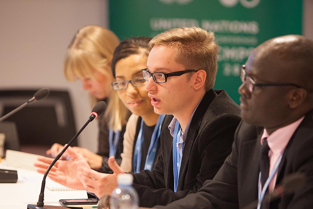 LWF delegate to UN Climate Conference (COP19) meeting in Warsaw, Poland, in 2013. Photo: LWF/Sean Hawkey