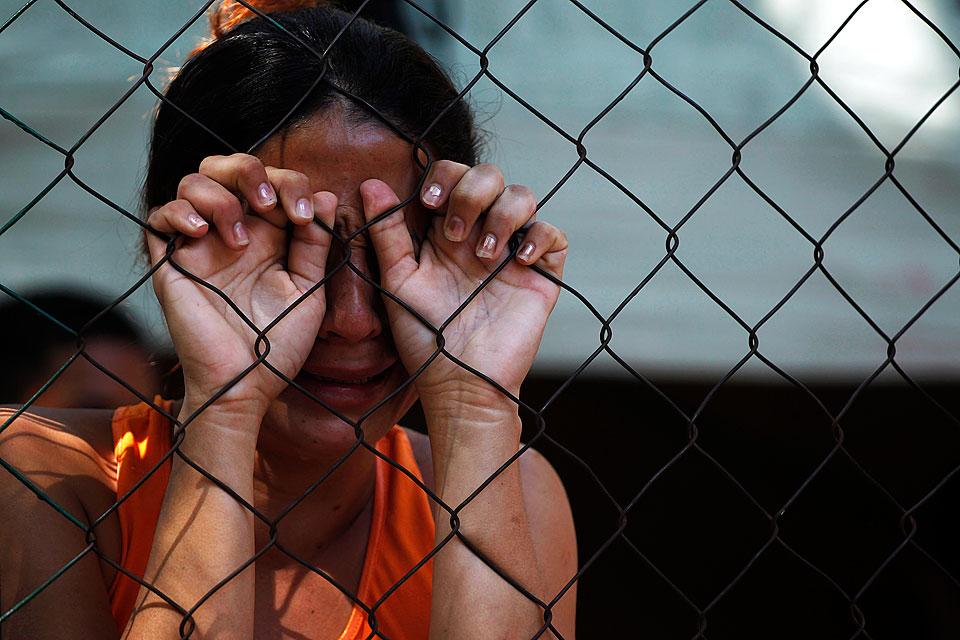 A woman grieves as she waits outside a morgue in Tegucigalpa to receive the body of her relative killed in the Comayagua prison fire. Â© Reuters/Jorge Lopez, courtesy Trust.org - AlertNet