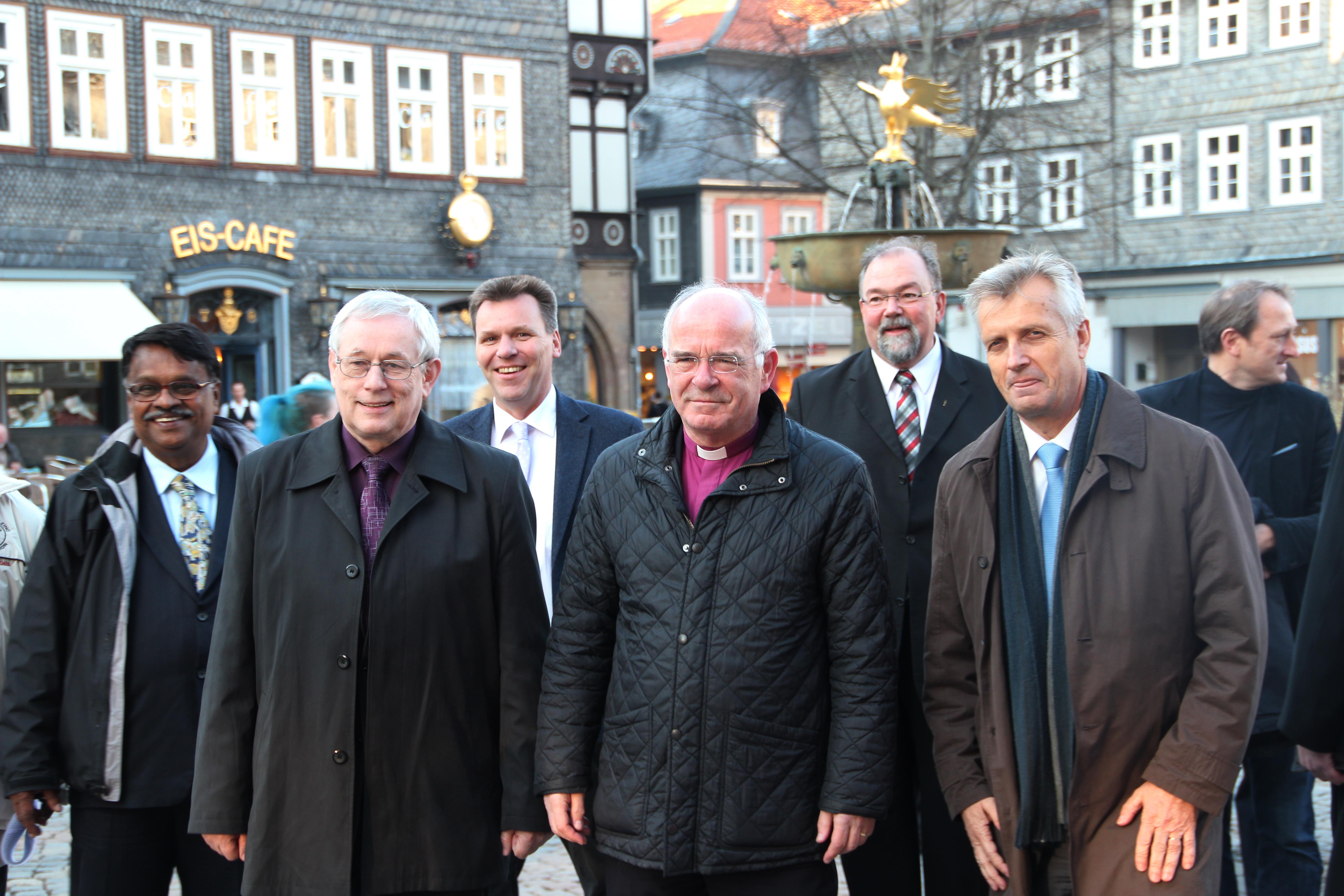 LWF General Secretary Rev. Martin Junge (right) with the Bishop of Brunswick Prof. Dr. Friedrich Weber (center), Jan Waclawek (left), Bishop of the Silesian Evangelical Church of the Augsburg Confession in the Czech Republic, and other guests during the walk through the city of Goslar. Photo: DNK/LWF. HÃ¼bner 