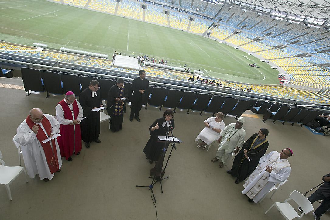Rev. Lusamarina Campos leads an interreligious service in May in the Maracana arena in the lead-up to the 2014 FIFA World Cup in Brazil. Photo: Vitor Jorge