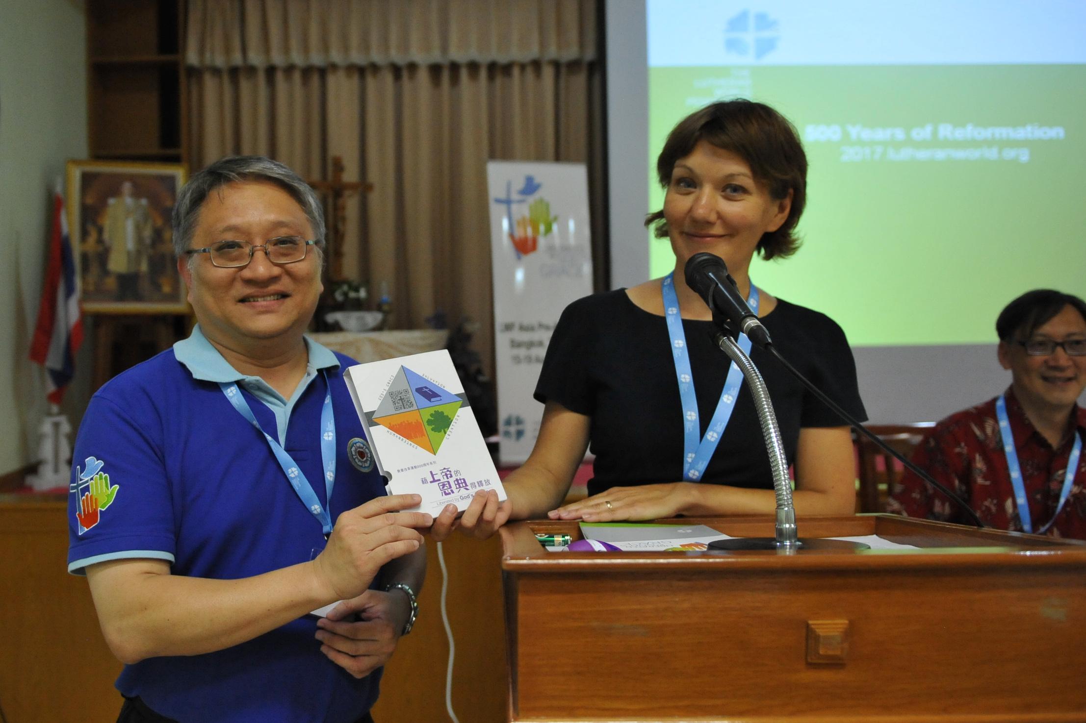 Anne Burghart, Secretary for Ecumenical Relations, with the Chinese translation of the Reformation Booklets. 
