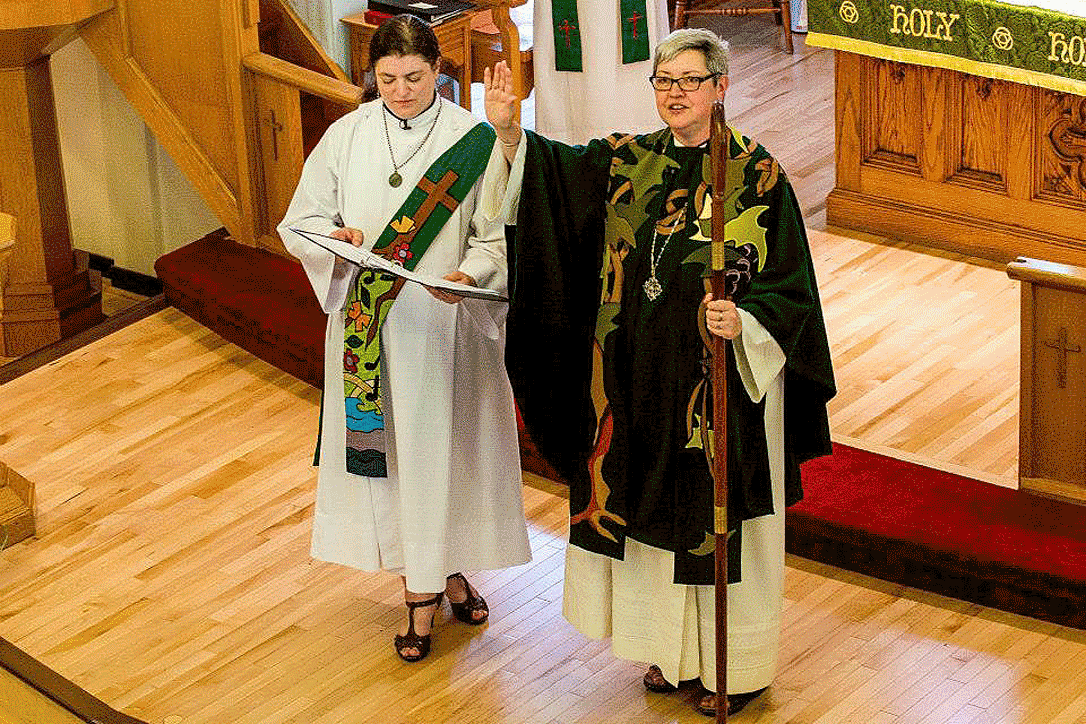 ELCIC National Bishop Susan Johnson (right), with Diaconal Minister Virginia Burke, at the convention closing worship service. Photo: ELCIC
