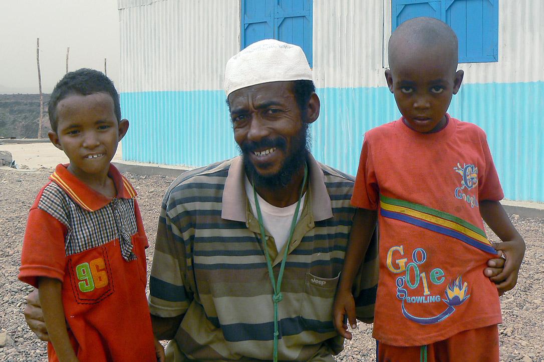 Ahmed with his children in Ali Addeh camp. The family had to flee violence for the safety of the camp in Djibouti. Photo: ALWS/Jonathan Krause 