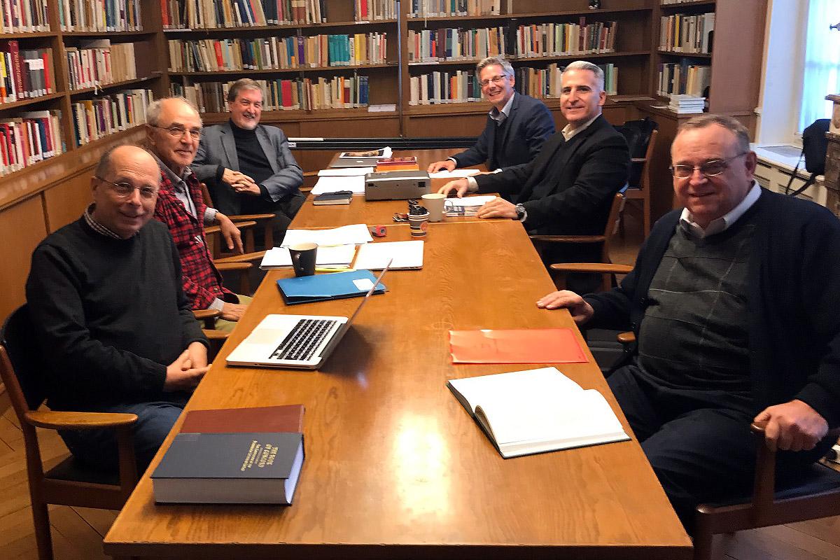 The team drafting the final report from the trilateral dialogue, and colleagues supporting them during the meeting in Strasbourg: from left to right; Prof. Theodor Dieter (Lutheran), Prof. John Rempel, Rev. Dr Larry Miller and Prof. Fernando Enns (Mennonite) and Rev. Avelino Gonzalez and Prof. William Henn (Catholic). Photo: Avelino Gonzalez