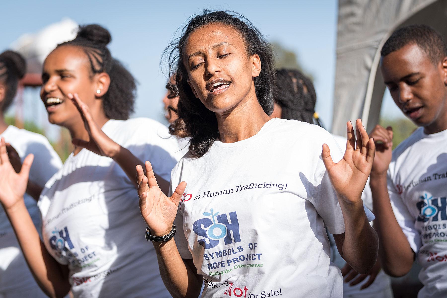A youth group performs at the inauguration of Bishoftu Integrated Aquaculture Vocational and Entrepreneurship Training Centre in early 2019, taking a stand against human trafficking, and the poverty that often fuels it: âHuman beings â Not for Sale!â All photos: LWF/Albin Hillert