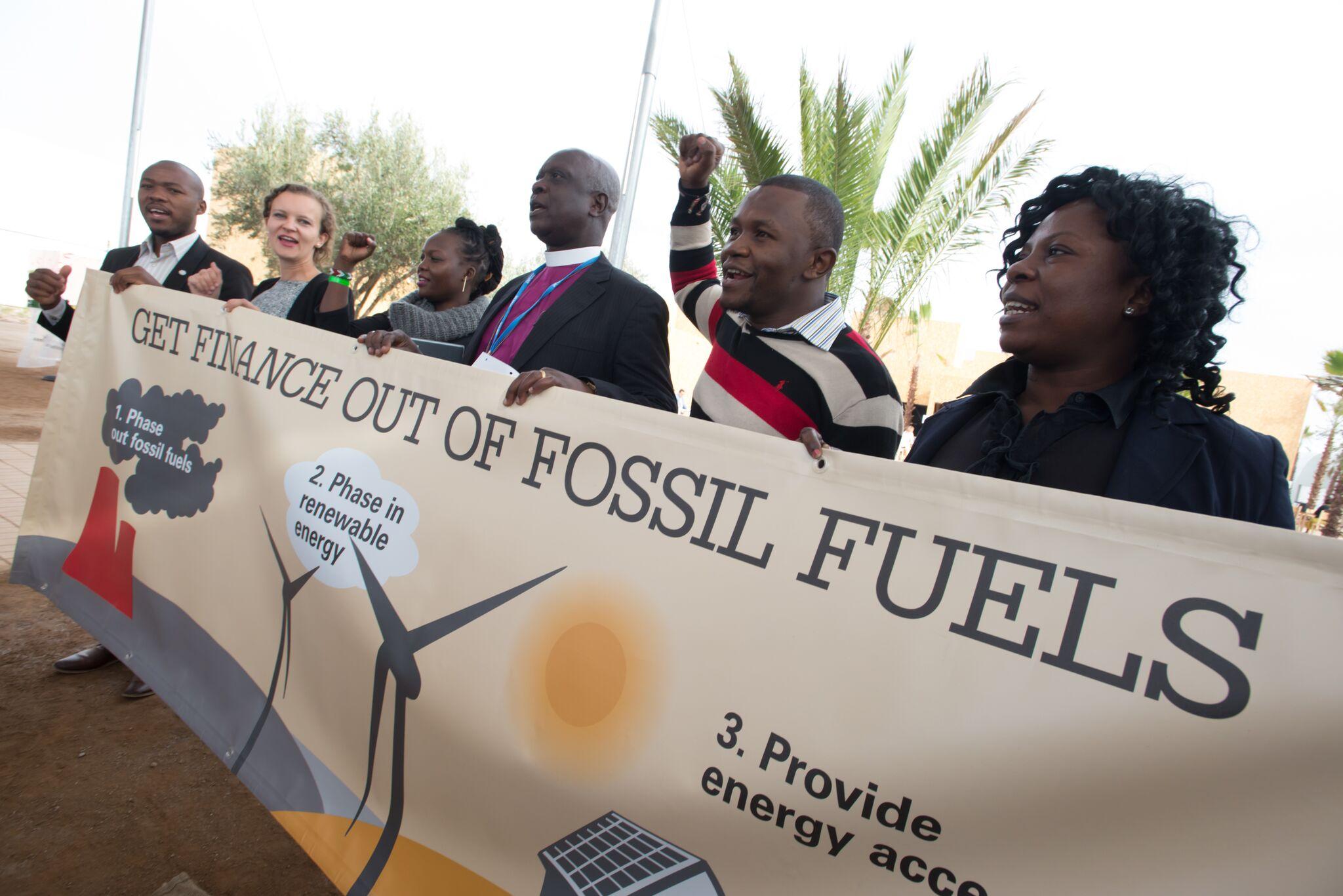 Campaign stunt symbolizing divestment from fossil fuels and support of renewable energies at COP 22 in Marrakech, Morocco in December 2016.  Photo by LWF/Ryan Roderick Beiler