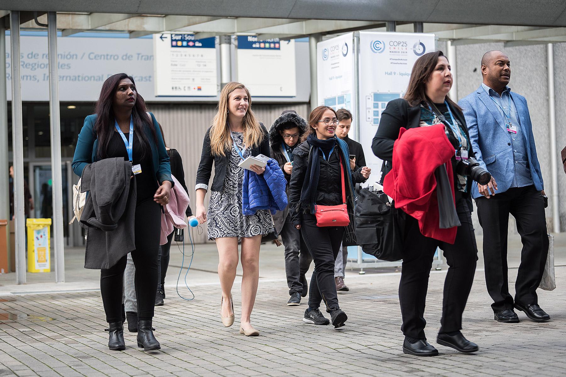 Lutheran World Federation delegates walk towards the plenary hall on day one of COP25 in Madrid. All photos: LWF/AlbinÂ HillertÂ 