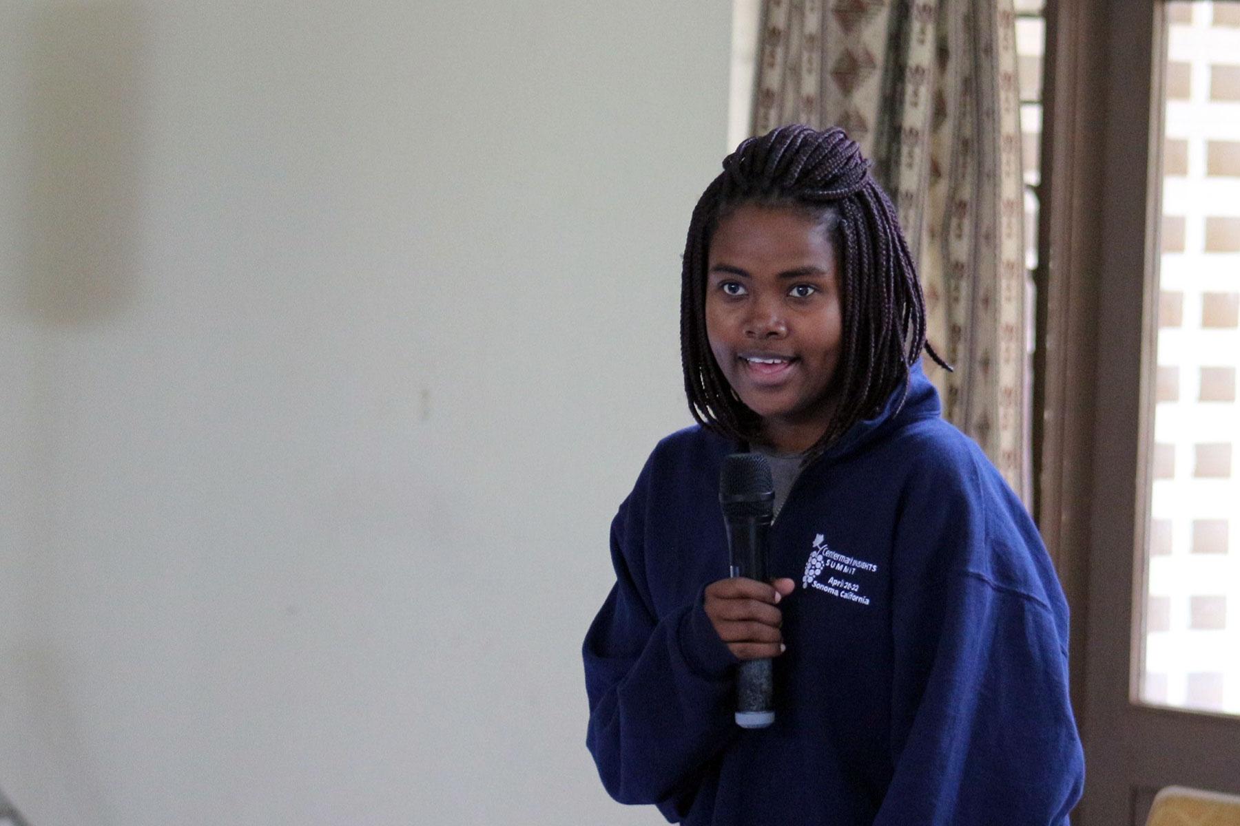 Young reformer Melisa Hove, Evangelical Lutheran Church in Zimbabwe, addressing the 2019 Africa Lutheran Church Leadership Consultation in Moshi, Tanzania. Photo: ALCINET 