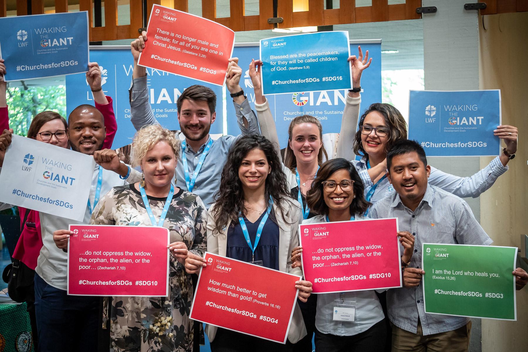 LWF Council members take part in a June 2019 event in Geneva to publicize the work of Waking the Giant. Photo: LWF/S.Gallay