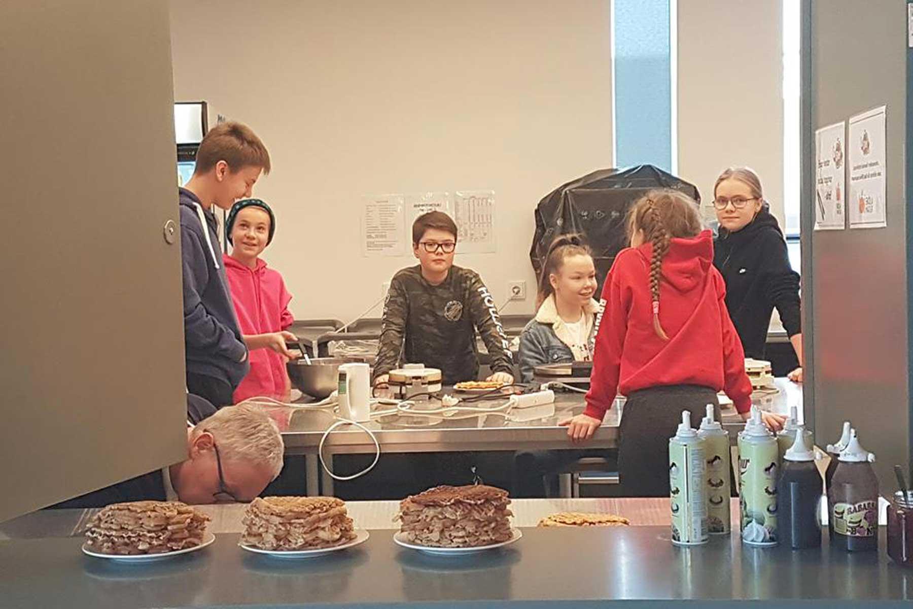 Selling waffles, a favorite dish, after worship was one way to raise to money for children in Uganda. Photo: Stefan Mar Gunnlaugsson / The Evangelical Church of Iceland