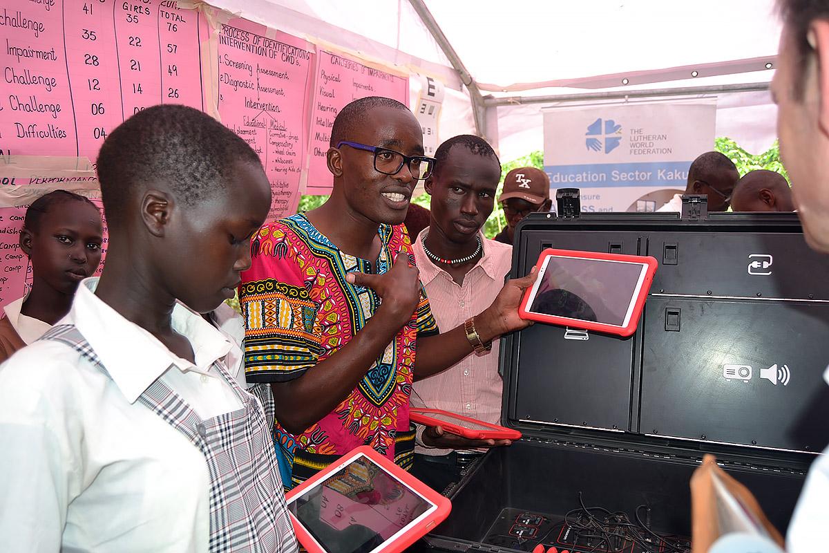 Students from LWFâs Angelina-Jolie school in Kakuma refugee camp with tablets in computer class. Photo: LWF
