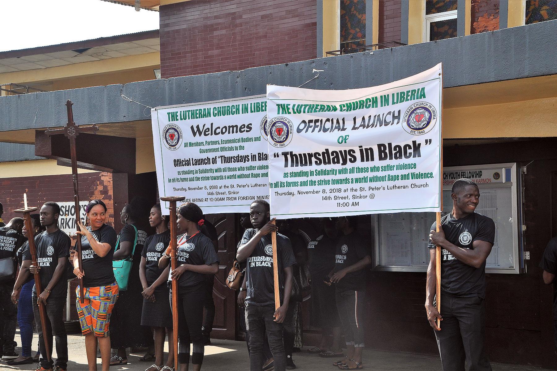Acolytes of the Lutheran Church in Liberia prepare to lead the march protesting all forms of violence in the Thursdays in Black campaign. All photos: LCL/ Linda Johnson Seyenkulo