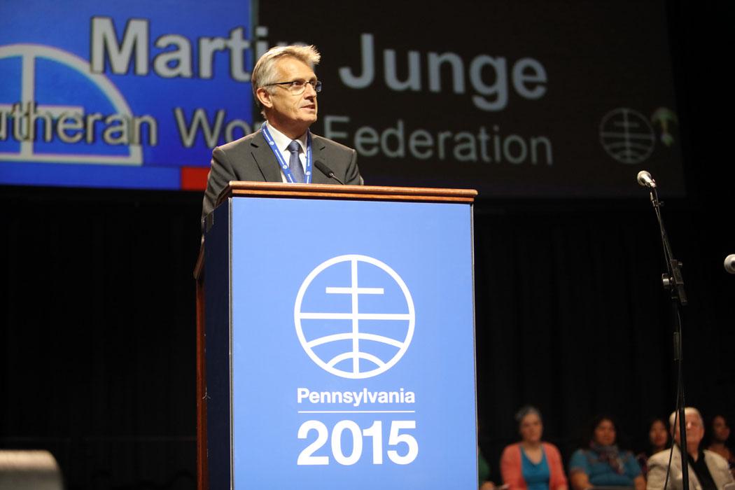 Rev. Dr Martin Junge addresses the Mennonite World Conference, saying the forgiveness of Mennonites brought Lutherans and Mennonites closer together to serve the world. Photo: Jon Carlson for Mennonite World Conference