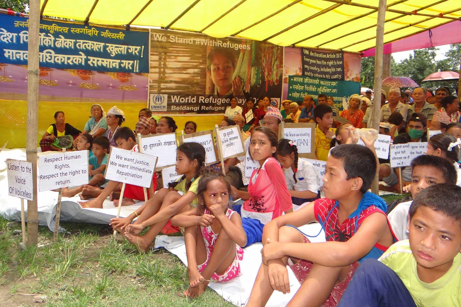 Refugee children demonstrating playcards for their rights on the World Refugee Day 2018. Photo: LWF Nepal.