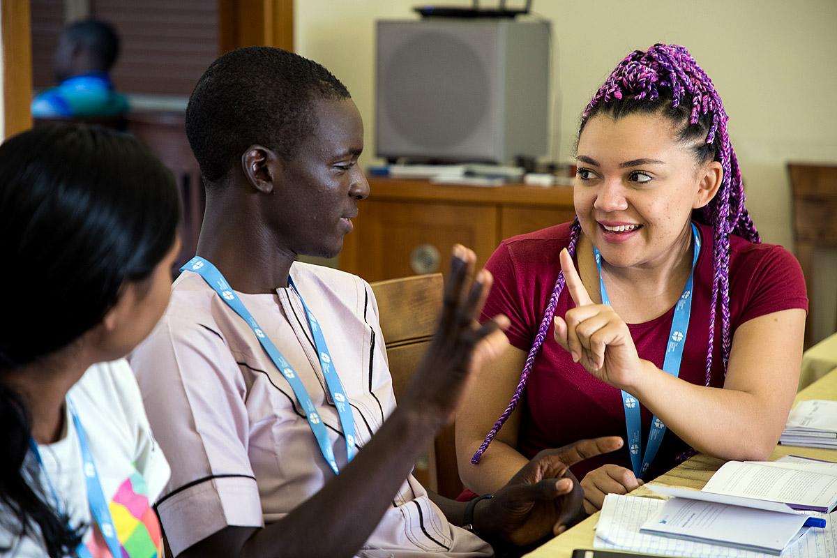 Group discussion during the training among Hanna Wright-Osborn (left) of the Evangelical Lutheran Church in America,  Levi Joniel (centre) of The Lutheran Church of Christ in Nigeria and  Angelica Oquendo (right) of the Evangelical Lutheran Church of Colombia. Photo: LWF/Ben Gray