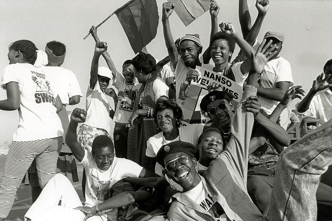 Students celebrate the return of exiled SWAPO leader Sam Nujoma on 14 September 1989
