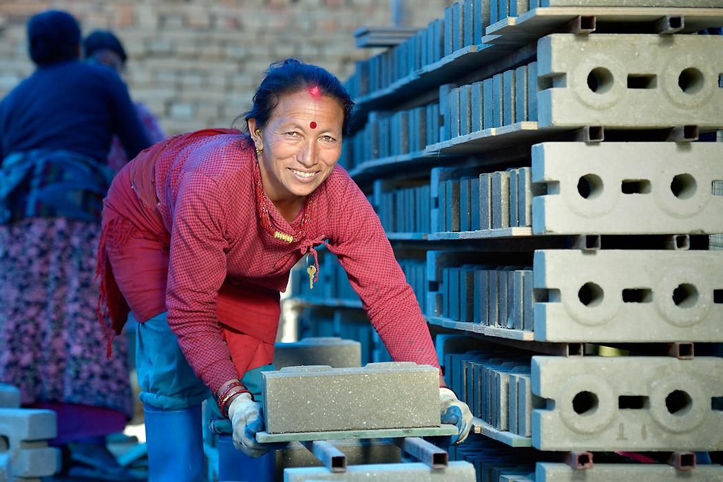 Women in Sanogoan are making the bricks that will form the basis of their new village. Photo: ACT Alliance/Paul Jeffrey