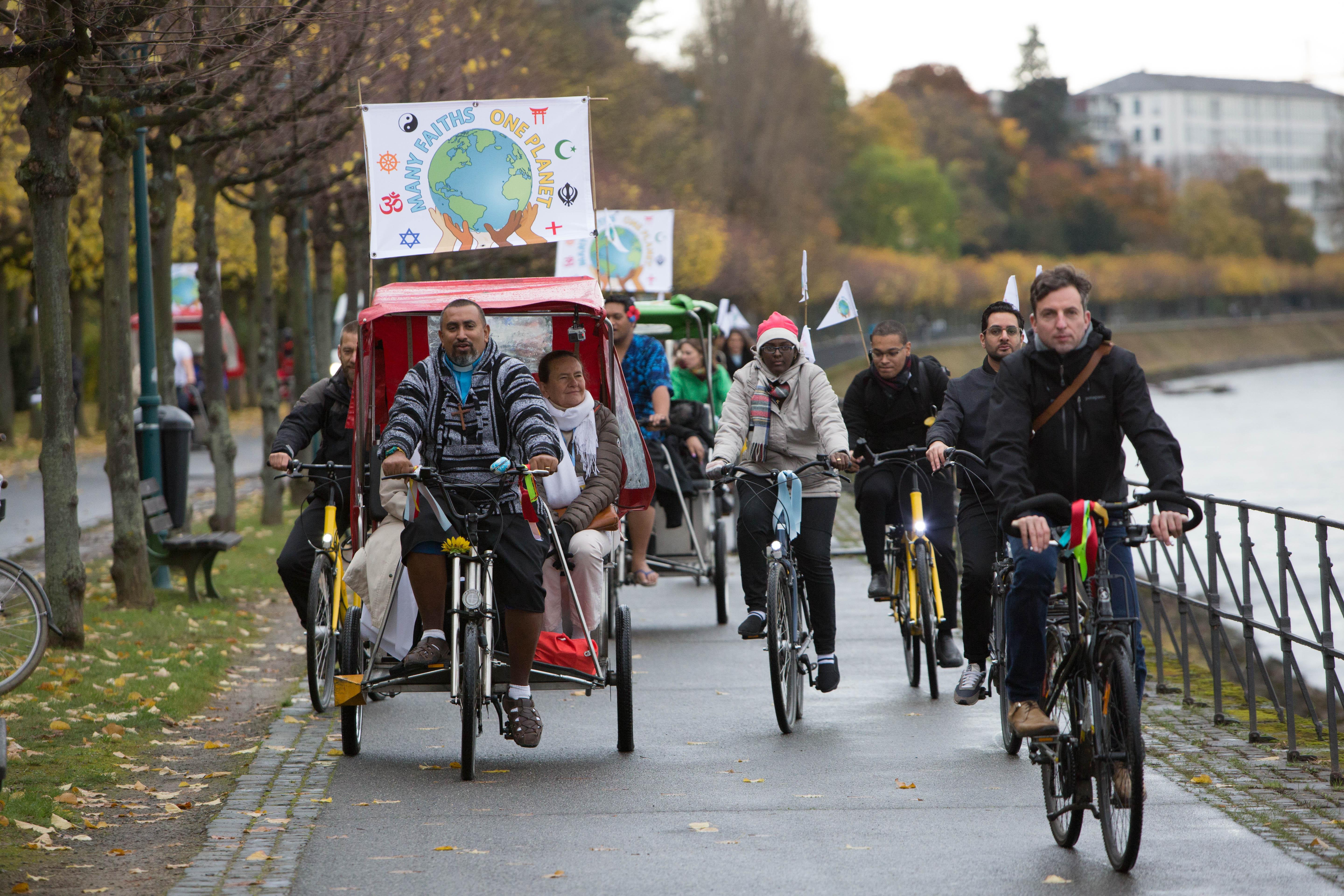 Joint engagement for justice: Interfaith bicycle demonstration at the climate conference in Bonn in 2017. Photo: Sean Hawkey/WCC
