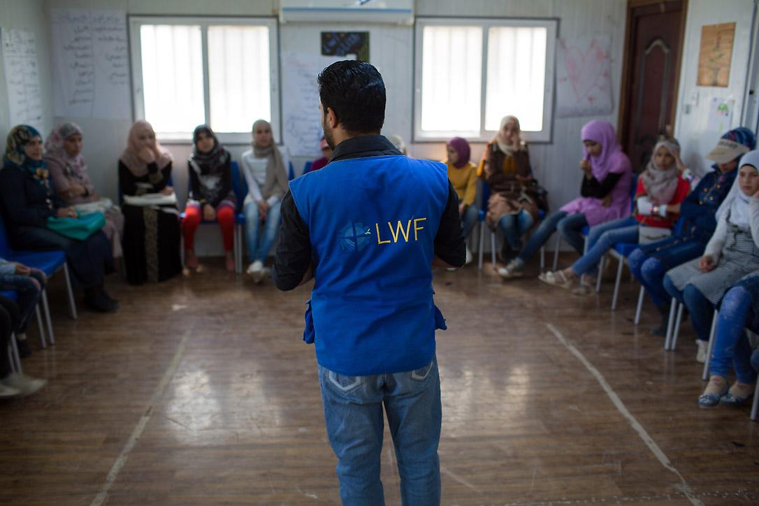 Syrian refugee Ahmad instills the value of education at the Za'atari camp. Photo: LWF Jordan