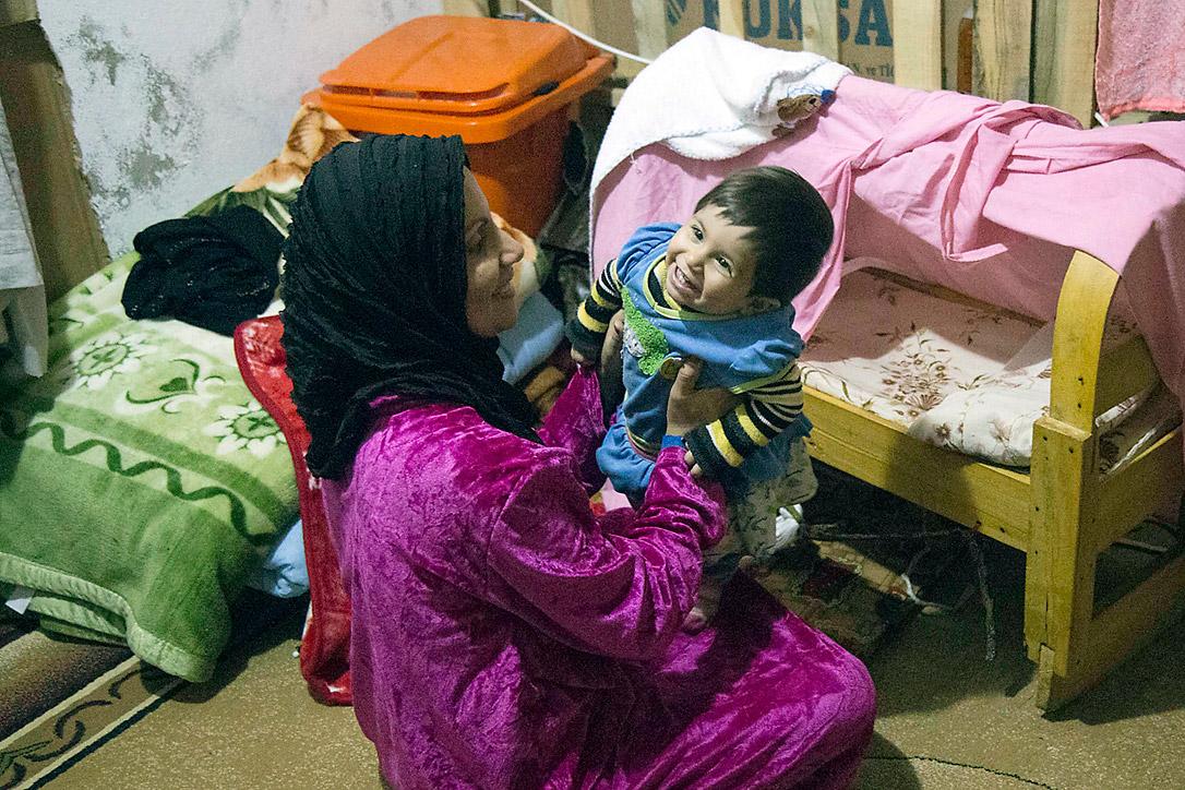 This Christmas, LWF President Bishop Younan draws attention to the plight of millions of refugees across the world, who like baby Amera and her mother in northern Iraq, are seeking refuge from persecution. Photo: LWF/Seivan Salim