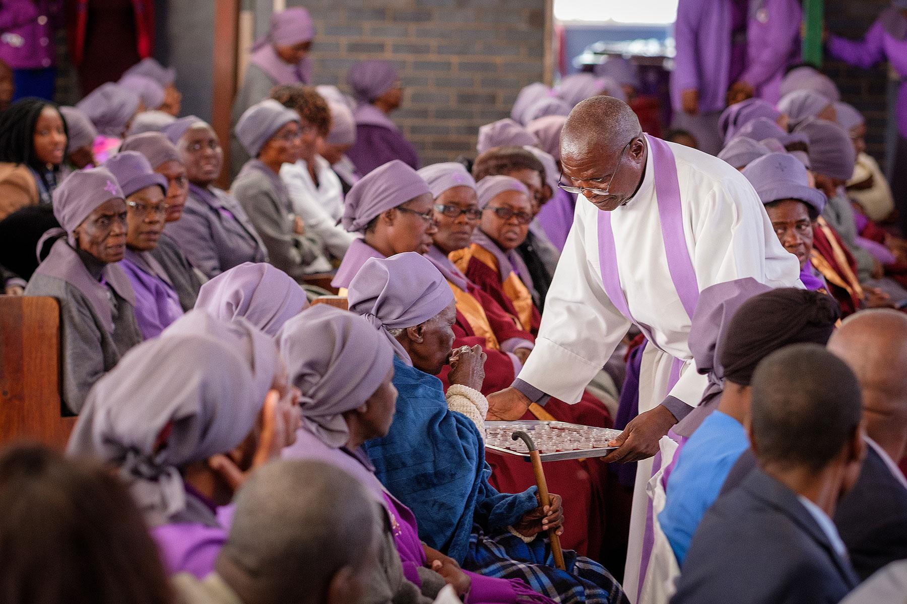 AÂ member of the Bulawayo congregation receives communion during the Sunday service.Â Photo: LWF/A. Danielsson