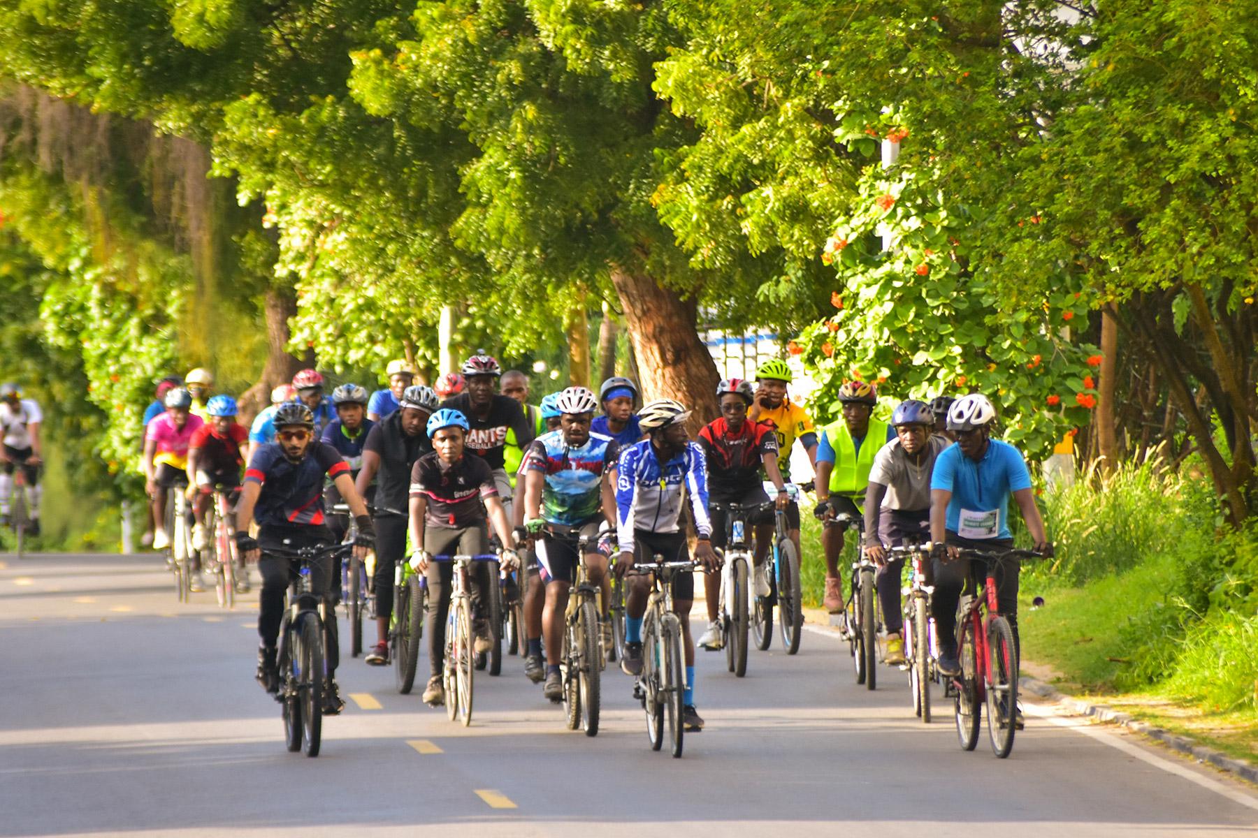 Maro Maua and his supporters cycling through Mombasa