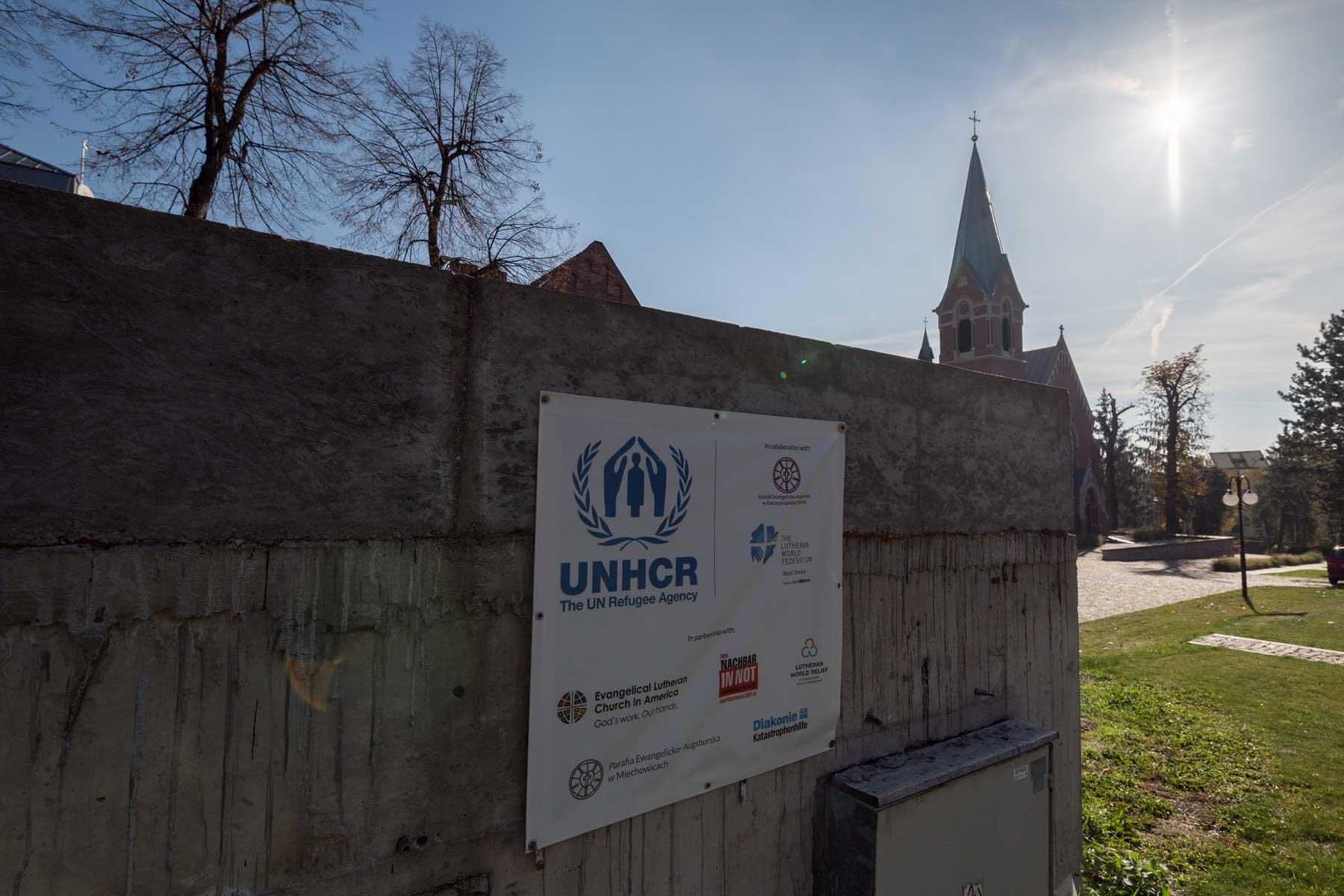 A sign leads the way towards the entrance of the LWF centre in Bytom, Poland, located at the Evangelical Church of the Augsburg Confession in Poland parish in Bytom. Photo: LWF/Albin Hillert