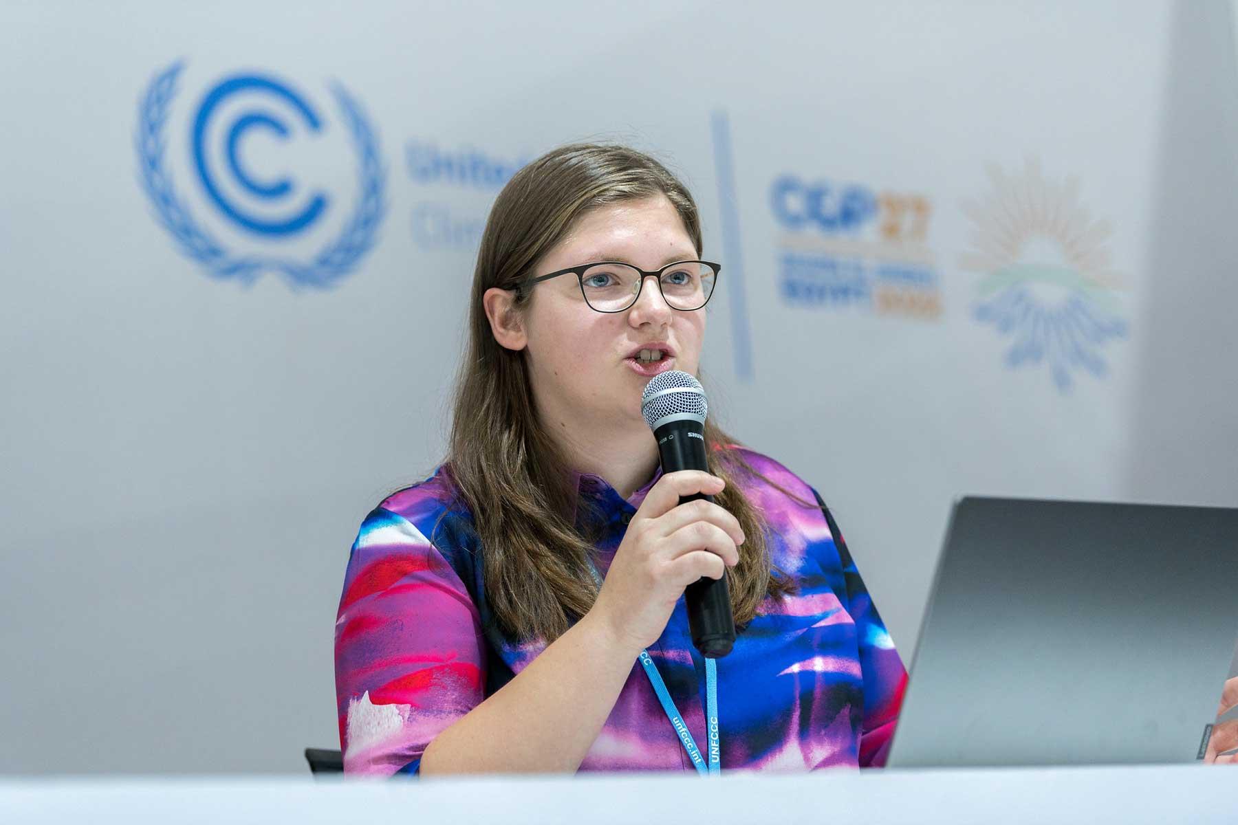 Michelle Schwarz from the Evangelical Lutheran Church in Saxony (Germany) is an LWF delegate to COP27. Here she speaks on an interfaith youth panel during a side event of the UN climate conference. LWF/Albin Hillert