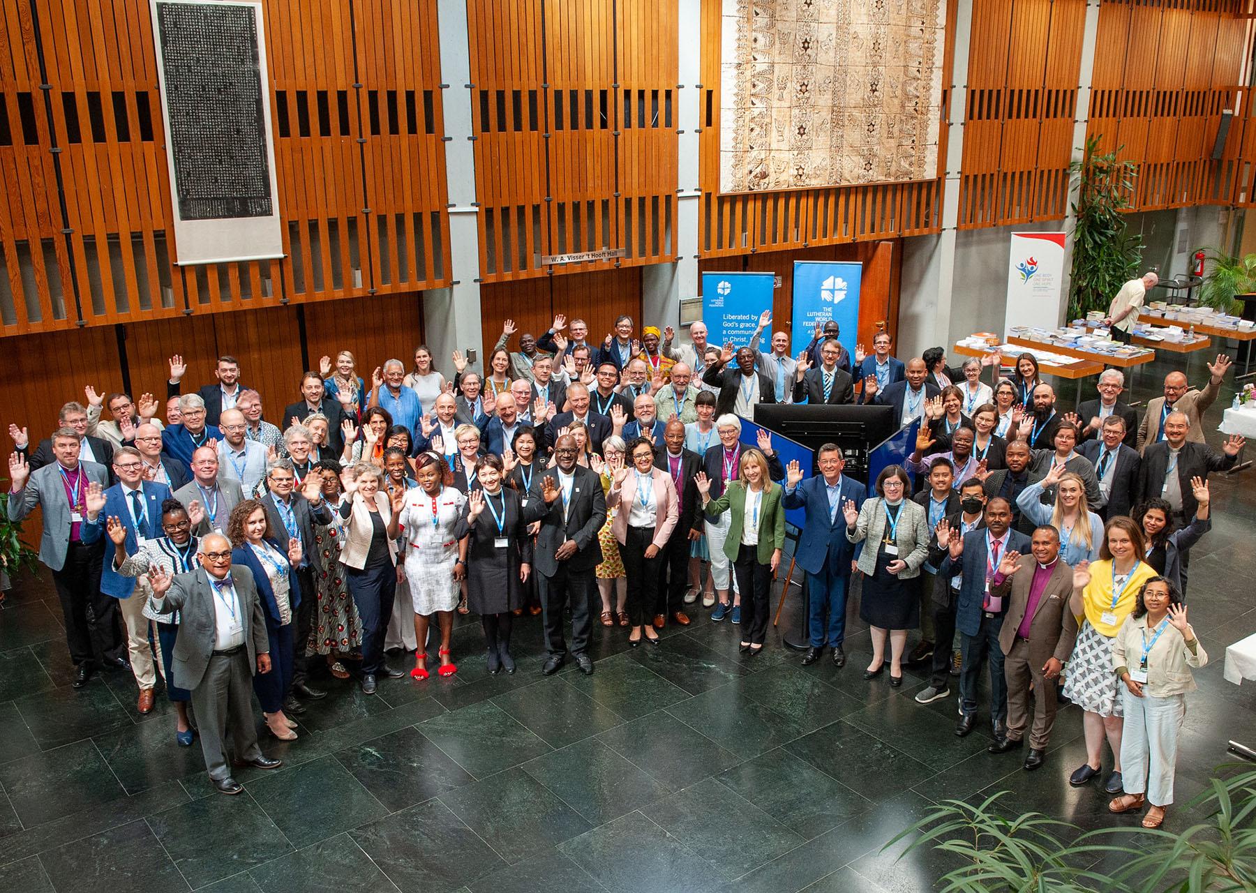 LWF Council in the lobby of the Ecumenical Center, with advisers, guests and LWF staff, in Geneva in 2022. Photo: LWF/S. Gallay