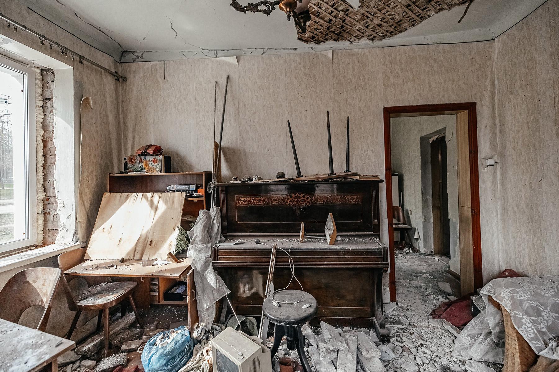 A living room in the Saltivka quarter, Kharkiv. The apartment blocks continue to be targeted by missiles. Photo: LWF/ Anantoliy Nazarenko