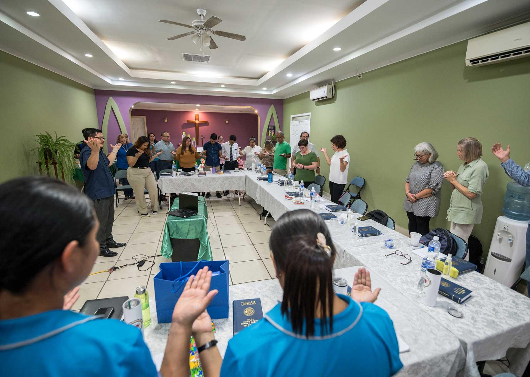 25 October 2023, Tegucigalpa, Honduras: Lutheran World Federation general secretary Rev. Dr Anne Burghardt gives the blessing as church members and visitors from the Lutheran World Federation gather for a moment of prayer at the Resurrection Church in Comayagüela. Photo: LWF/A. Hillert